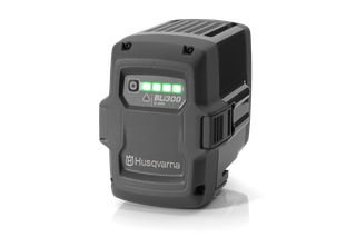 Front view of a Husqvarna BLi300 battery with charge indicator lights.