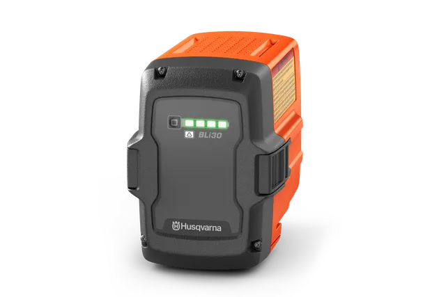 Vue de face d’une batterie Husqvarna BLi30 avec des indicateurs LED indiquant le niveau de charge.