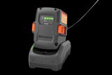 Front view of a Husqvarna battery charger with battery inserted.