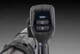 Close-up of a control handle with a digital display showing battery level.