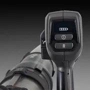 Close-up of a control handle with a digital display showing battery level.