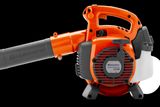Side view of a Husqvarna leaf blower showing the air intake and fuel tank.