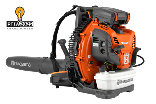 Side view of a Husqvarna backpack leaf blower with visible fuel tank and PTIA 2025 award badge.