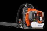 Side view of a Husqvarna backpack leaf blower with ergonomic design.