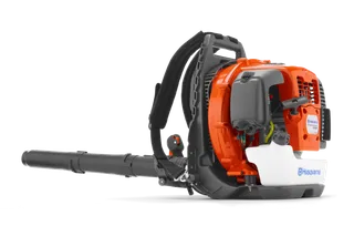 Side view of a Husqvarna backpack leaf blower with visible controls and straps.