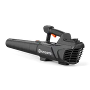 Вигляд збоку на ручний повітродув для прибирання листя Husqvarna.