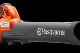 Side view of a Husqvarna leaf blower showcasing its ergonomic design.