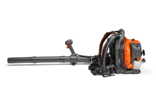 Side view of a backpack leaf blower with ergonomic handle and harness.