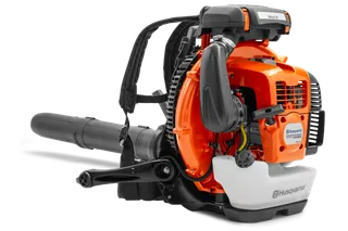 Side view of a Husqvarna backpack leaf blower showcasing its engine and harness.