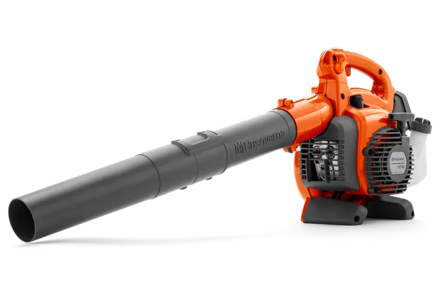 Side view of a Husqvarna leaf blower with ergonomic handle and visible fuel tank.