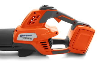 Side view of a Husqvarna Leaf Blaster 350iB, showcasing its ergonomic handle and design.