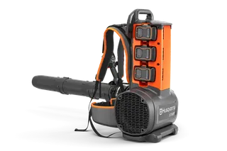 A Husqvarna backpack leaf blower with visible battery compartments.