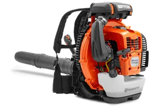Side view of a Husqvarna backpack leaf blower showcasing its engine and straps.