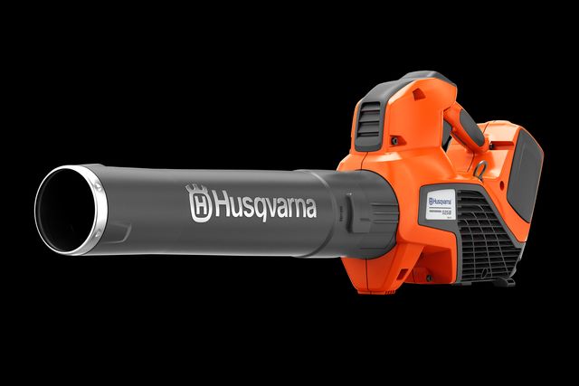 Vue latérale d’un souffleur de feuilles Husqvarna présentant son design et son image de marque.