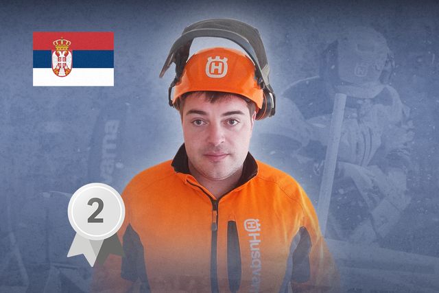 Person som bär arbetskläder från Husqvarna och skyddshjälm med serbisk flagga.