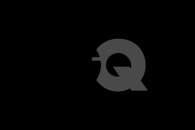Graphic of bold overlapping letters G and Q in monochrome, studio composition.