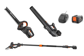 A set of Husqvarna gardening tools including a hedge trimmer, leaf blower, chainsaw, battery, and charger.