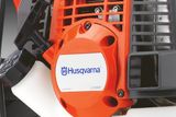 Close-up de um componente do motor X-Torq Husqvarna.