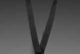 Top view of a black adjustable strap with a metal hook.