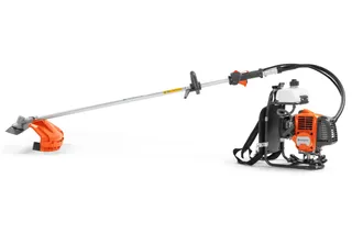 HUSQVARNA 331RB. Side view of a Husqvarna brushcutter with a backpack harness.