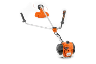 Side view of a Husqvarna brush cutter with ergonomic handle and cutting head.