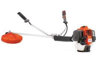 Vista lateral de una desbrozadora Husqvarna con mango ergonómico y protector