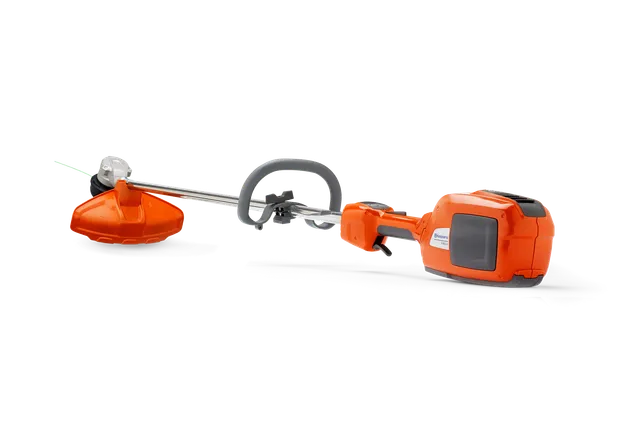 Side view of a Husqvarna battery-powered grass trimmer with ergonomic handle.