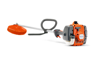 Side view of a Husqvarna brush cutter with a visible engine and handle.