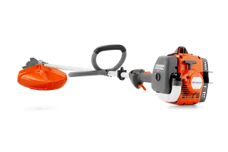Side view of a Husqvarna brushcutter with ergonomic handle and control panel.