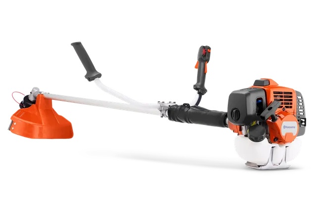 Máy cắt cỏ HUSQVARNA 541RS. Mặt bên của máy cắt cỏ Husqvarna với tay cầm tiện dụng và bộ phận bảo vệ.