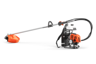 Side view of a backpack brush cutter with an extended handle and cutting blade.
