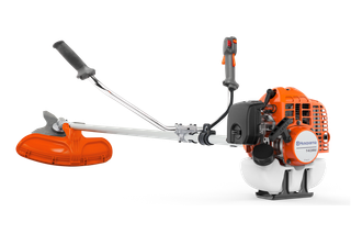 Vista lateral de una desbrozadora Husqvarna con doble mango y un disco de corte.