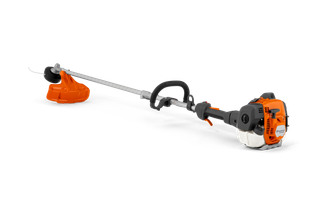Side view of a string trimmer with visible engine and cutting head.