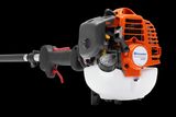 Vista lateral de uma roçadora Husqvarna com motor e pega visíveis.