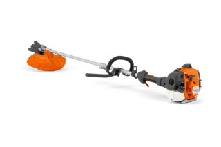 Husqvarna 525RJD Mark II. Side view of a Husqvarna grass trimmer with visible engine and grass blade.