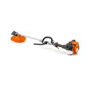 Husqvarna 525RJD Mark II. Side view of a Husqvarna grass trimmer with visible engine and grass blade.