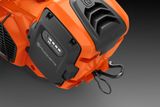 Close-up view of a Husqvarna product showcasing its battery compartment and connectors.