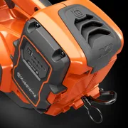 Close-up view of a Husqvarna battery compartment on a power tool.