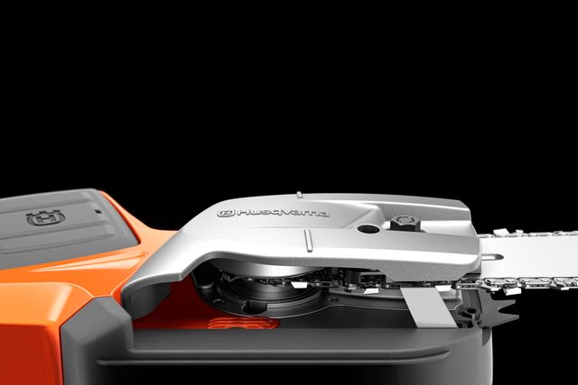 Nahaufnahme eines Kettenspannsystems für Husqvarna-Motorsägen.