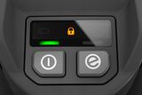 Close-up view of a control panel with buttons and a lock symbol.