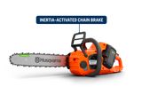 Side view of a Husqvarna chainsaw with an inertia-activated chain brake label.