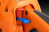Close-up view of a chainsaw's control handle with a red and blue lever.