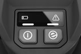 Close-up view of a control panel with battery and warning icons.