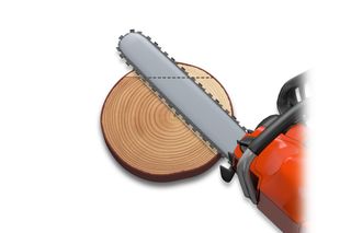 Chainsaw cutting through a round wooden log from a top view.