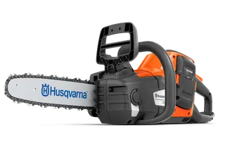Side view of a Husqvarna chainsaw with visible branding.