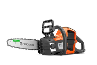 Front-side studio view of a Husqvarna chainsaw showing the guide bar and chain.