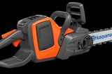 Side view of a Husqvarna chainsaw with ergonomic handle and visible branding.