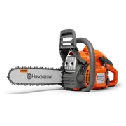 Side view of a Husqvarna chainsaw with X-Force bar and branding visible.