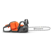 Side view of a Husqvarna chainsaw showcasing its design and features.