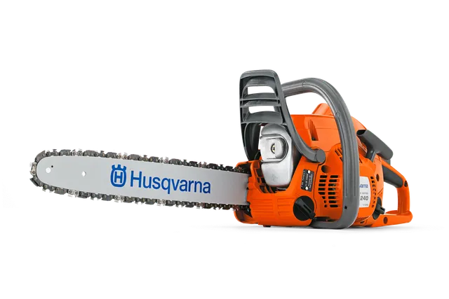 Side view of a Husqvarna chainsaw showcasing its design and features.